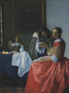 Dama con dos caballeros Johannes Vermeer (1659)